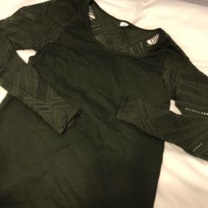 Dark green Fabletics top with cutouts